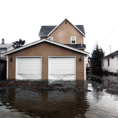 House-with-flooded-basement Flood Damage